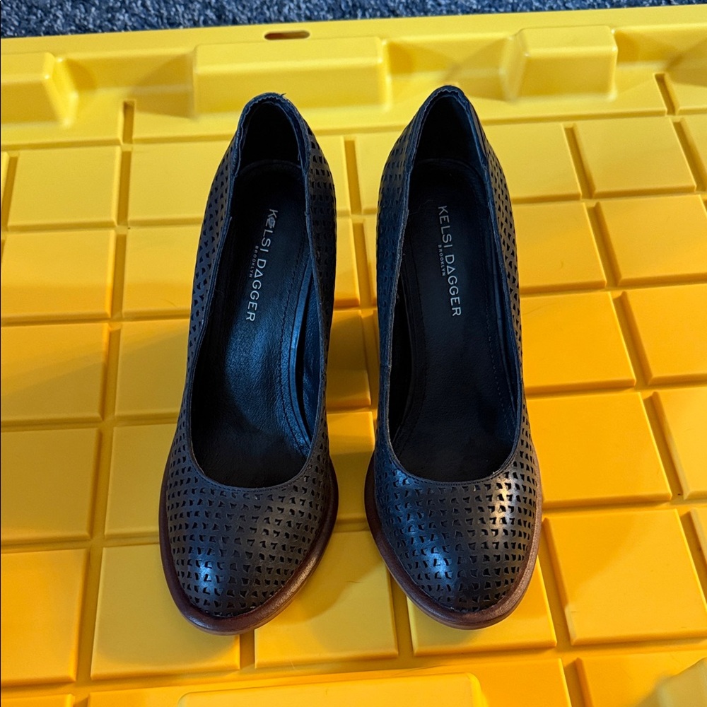 Kelsi Dagger Black Perforated Round-Toe Pumps